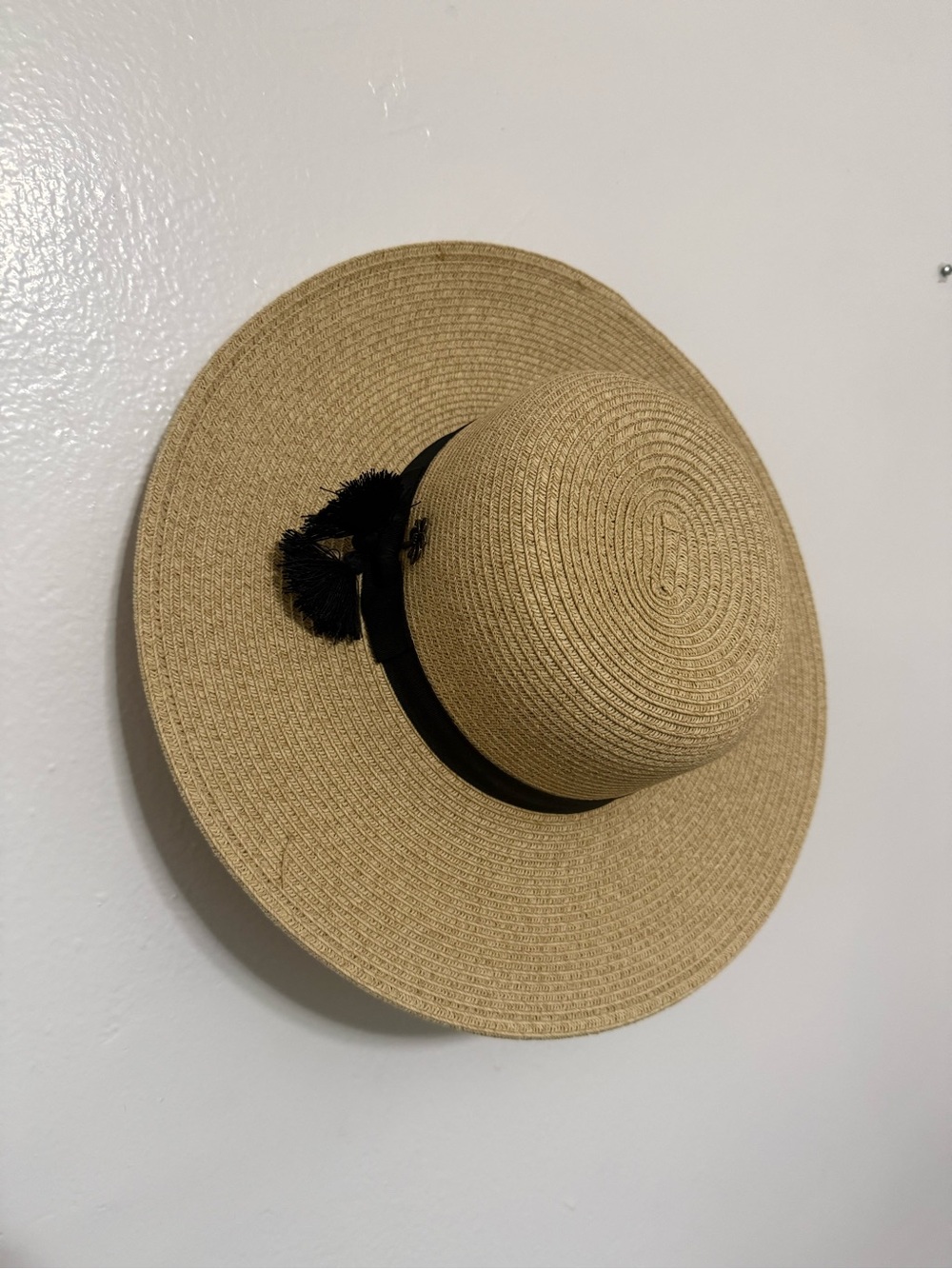 Wide-Brim Straw Sun Hat with Black Band and Tassel Accent